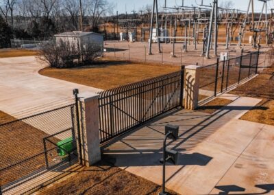 Commercial security gate and chain-link fence representing Tulsa, Oklahoma commercial fence installation services