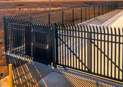Commercial ornamental iron fence installation showcasing the durable, high-security metal fencing solutions installed by Vector Fence.