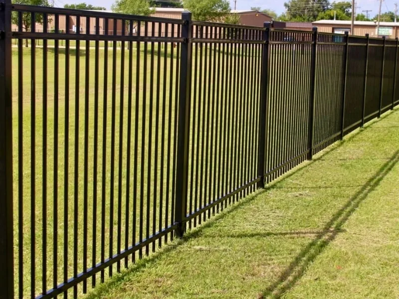 Commercial Ornamental Iron Fence Installation | VectorFence.com Commercial ornamental iron fence installation providing strong perimeter security and a clean, professional appearance.