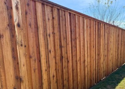 8-foot board-on-board cedar fence with cap and trim showcasing Vector Fence’s residential cedar fence installation services.