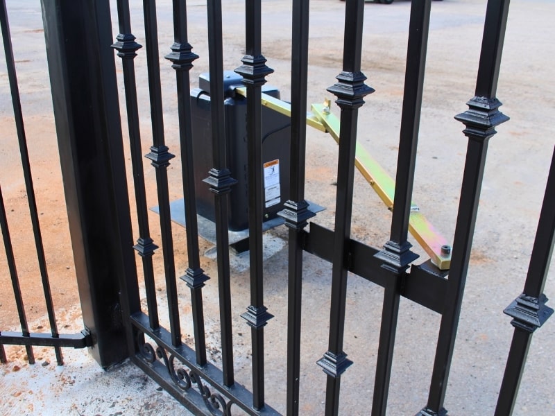 Close-up of a gate operator installed on a decorative steel gate, showcasing professional automatic gate operator installation for smooth and secure operation.