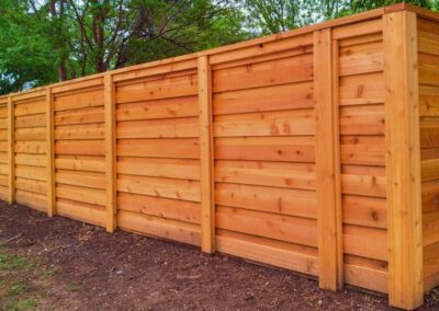 Horizontal cedar wood privacy fence highlighting Vector Fence’s residential installation services in Tulsa, Oklahoma.