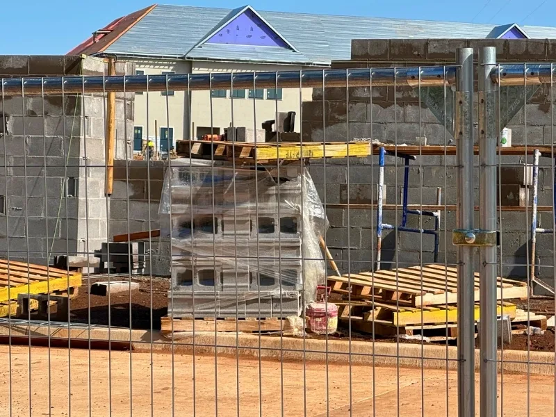Free-Standing Temporary Fence Installation | Vector Fence Free-standing temporary fence panels installed at an active construction site, providing portable perimeter security without ground penetration.
