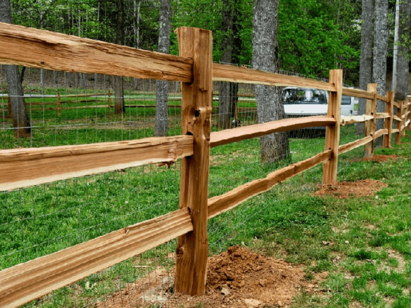 Tulsa, Oklahoma, Cedar Split Rail Fence Installation Services by Vector Fence Cedar split rail fence installation services in Tulsa, OK by Vector Fence.