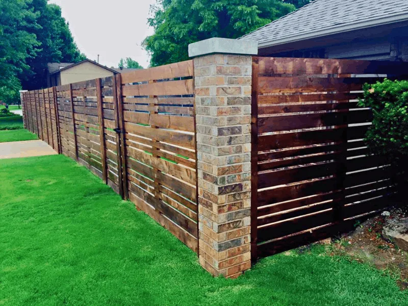 Custom Horizontal Wood Privacy Fence Installation Services | Vectorfence.com Modern horizontal wood privacy fence with brick columns installed by Vector Fence.